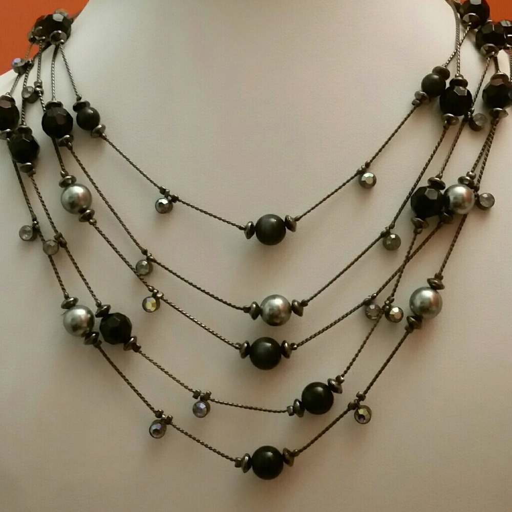 MULTI STRAND NECKLACE